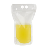 A clear, 16 oz. polyethylene To-Go Beverage Pouch with a resealable zipper is filled halfway with yellow liquid. Three circular holes at the top make it easy to hang or carry, and it is photographed against a plain white background.