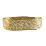 A gold powder coat aluminum oval bowl with slightly raised edges. Its exterior features an intricate crackle pattern, giving a textured, decorative look, while the smooth, reflective interior contrasts beautifully against the plain white background.