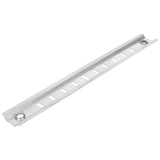 A metal mounting rail, the Empura shelf pilaster E-KSP29, features a slightly raised edge and evenly spaced rectangular slots. With round holes at each end for screws or bolts, this silver rail is part of genuine Empura refrigeration parts.