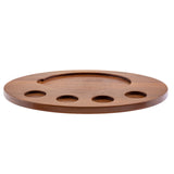 A round, flat Acacia fajita serving board with a smooth finish, featuring one large semicircular groove and five smaller circular grooves along the edge. The tray is empty and set against a white background.