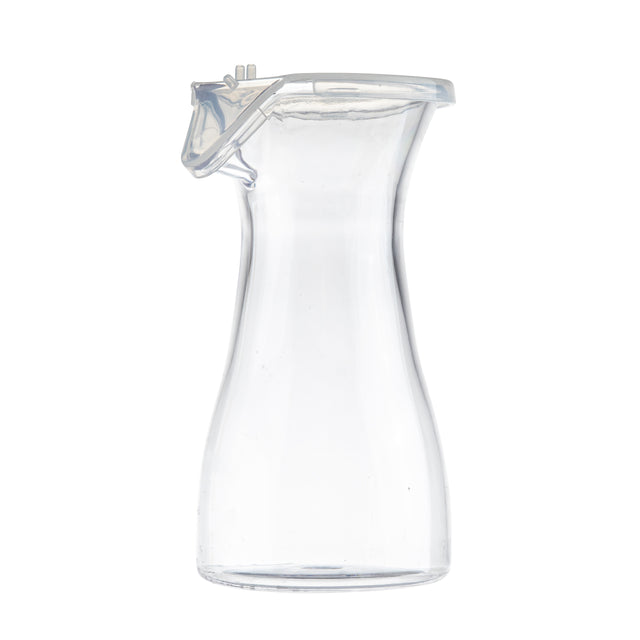 A clear, empty glass carafe with a wide base, narrow neck, and a transparent polypropylene lid. The carafe is shown against a plain white background, and its minimalist design highlights its clean lines and smooth surface.