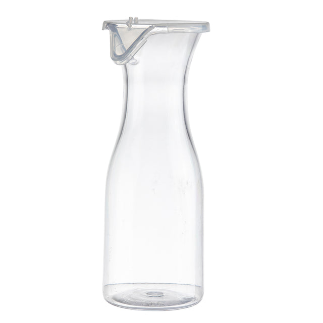 A tall, clear 19 oz polycarbonate carafe with a narrow neck and flared rim is shown upright against a white background. The carafe includes a transparent plastic lid with a metal clasp. Its overall design is simple and modern.