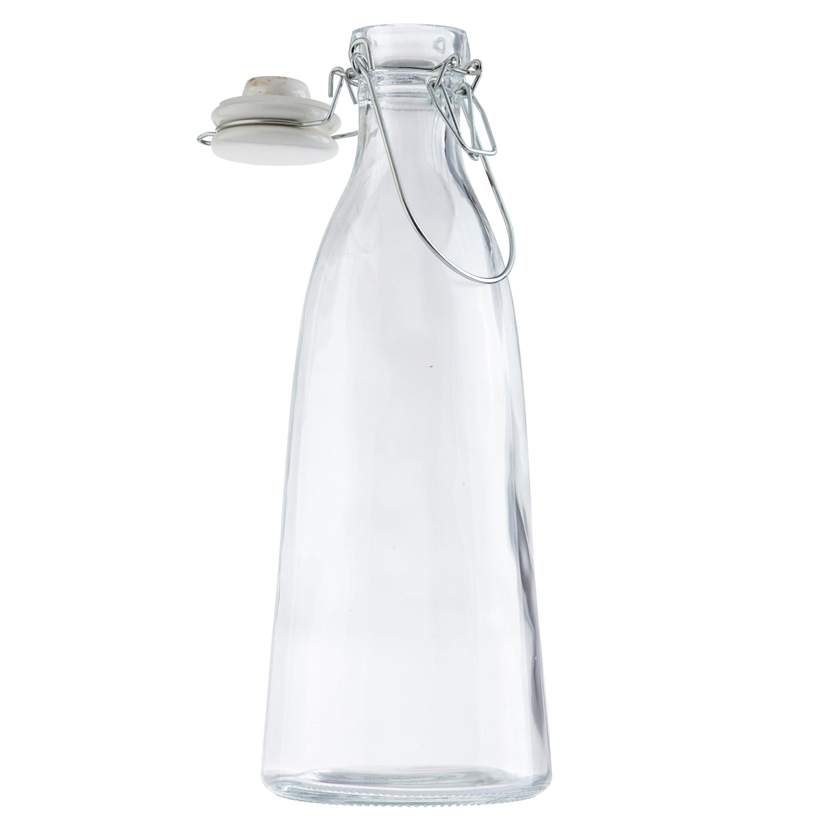 Tall, clear glass carafe with a wide base narrowing toward the top, featuring a metal swing-top clasp and a white ceramic stopper. This 34 oz carafe stands empty and upright against a plain white background.