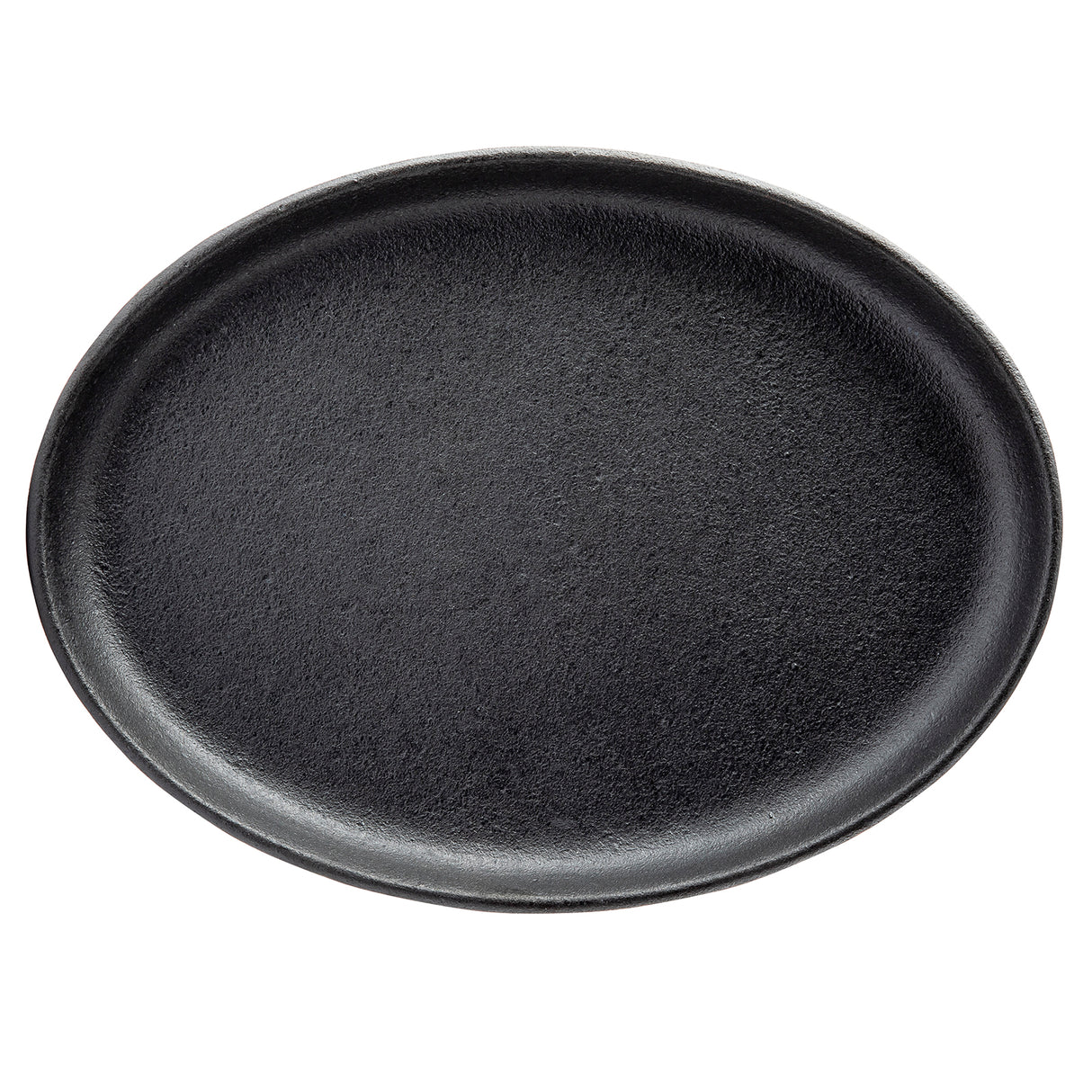 A round, empty black plate with a slightly raised rim, photographed from above against a white background. The plate has a matte, textured surface and resembles a classic TableCraft sizzle platter made of ceramic or stoneware.