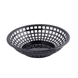A round, shallow black plastic serving basket with a grid-like, open-weave design. The basket has a solid circular base and outwardly sloping sides with square openings. Dishwasher safe, it is empty and placed on a white background.