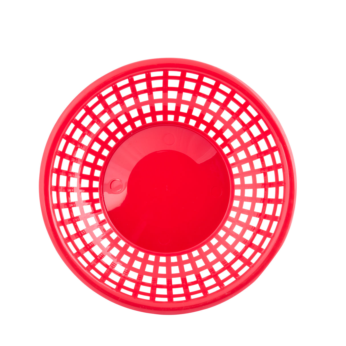A red plastic Serving Basket viewed from above, with a solid circular base and open grid-like sides forming a pattern of square holes. This heat resistant basket is empty and placed against a white background.