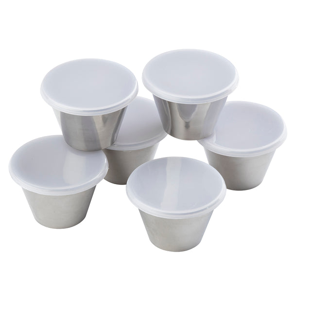 Six small 5 oz stainless steel ramekin containers with white plastic lids are arranged in a group on a white background, featuring smooth, reflective surfaces and tightly sealed tops.