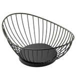 The Parisian Collection Wire Basket is a black, oval-shaped wire fruit basket with an open design and solid circular base. Its powder coated steel wires curve outward and upward to form a chic, slanted rim.