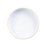 A round, empty ceramic bowl with a light beige outer rim and a smooth white interior, viewed from directly above against a white background; this bowl is stackable for easy storage.