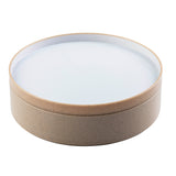 A round, shallow bowl with beige sides and a white, flat top. Made of natural, textured material—possibly ceramic or eco-friendly composite—it features a minimalist, modern design and is stackable for easy storage.