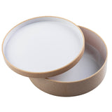 A round, beige styrene plastic bowl with a matching removable lid, both featuring a smooth white interior. The lid is slightly tilted and resting against the rim of the open, spacious, glossy container.