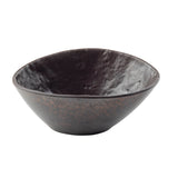 A dark, matte-finished Lunara Collection Bowl with a wide, slightly uneven rim and textured surface. The bowl’s stone pattern and subtle reddish speckles highlight its round base and gently flared, shallow design.