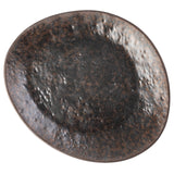 A large, oval-shaped Lunara Collection Plate with a textured, uneven surface. The plate is primarily dark brown with a subtle stone pattern in lighter tones, giving it an earthy, rustic appearance. The edges are slightly raised and irregular.