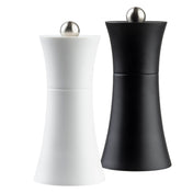 A pair of curved TableCraft salt & pepper mills with brushed metal knobs on top; one is matte white and the other matte black, both standing upright against a white background.