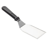 A TableCraft stainless steel turner with a wide, flat, rectangular blade and black plastic handle. The angled, straight-edged blade is perfect for flipping or serving food. Dishwasher safe for easy cleaning. Set against a plain white background.