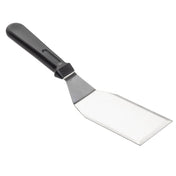 A TableCraft stainless steel turner with a wide, flat, rectangular blade and black plastic handle. The angled, straight-edged blade is perfect for flipping or serving food. Dishwasher safe for easy cleaning. Set against a plain white background.