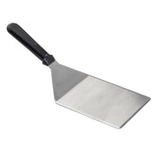 A Heavy Turner metal spatula with a flat, wide stainless steel blade and a black plastic handle. The shiny blade has a slight angle for easy flipping or lifting food. Dishwasher safe and set against a plain white background.