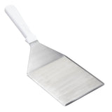 A wide, flat Heavy Turner spatula with a white plastic handle. The stainless steel rectangular blade with slightly tapered sides is perfect for flipping or serving food. Its smooth, rounded handle is securely attached and dishwasher safe for easy cleaning.