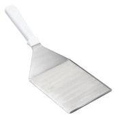 A wide, flat Heavy Turner spatula with a white plastic handle. The stainless steel rectangular blade with slightly tapered sides is perfect for flipping or serving food. Its smooth, rounded handle is securely attached and dishwasher safe for easy cleaning.