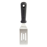 The PerfectGrip Slotted Spatula by TableCraft Products features a stainless steel blade with two long slots and a beveled edge, ideal for flipping and serving food. Its ergonomic, textured black handle includes a hole for convenient hanging.