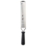 A TableCraft PerfectGrip Grater with a long, narrow stainless steel grating blade and fine holes, attached to a black plastic handle. The tool is shown vertically on a white background, handle at the bottom and grating surface facing forward.