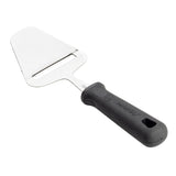 A stainless steel cheese plane with a flat, triangular blade and horizontal slot is attached to a black, textured PerfectGrip Cheese Plane handle. The slicer’s angled design highlights its reflective surface and sturdy construction.