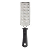 The PerfectGrip Grater is a stainless steel grater with a rectangular surface and rows of medium holes. Its black, textured handle offers comfort and includes a hanging hole. The design is simple and utilitarian against a plain white background.