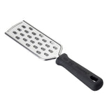A flat, rectangular stainless steel grater with large oval holes, the PerfectGrip Grater features a sturdy black ergonomic handle and a hole for hanging. Its shiny, reflective surface makes it ideal as a large hole grater for easy shredding.