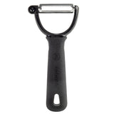 A black Y peeler with a textured, non-slip handle and a wide horizontal stainless steel blade at the top. The handle features "Refversgrip" embossed on it and a hole for hanging. Ideal for easy peeling, thanks to its ergonomic Y peeler design.
