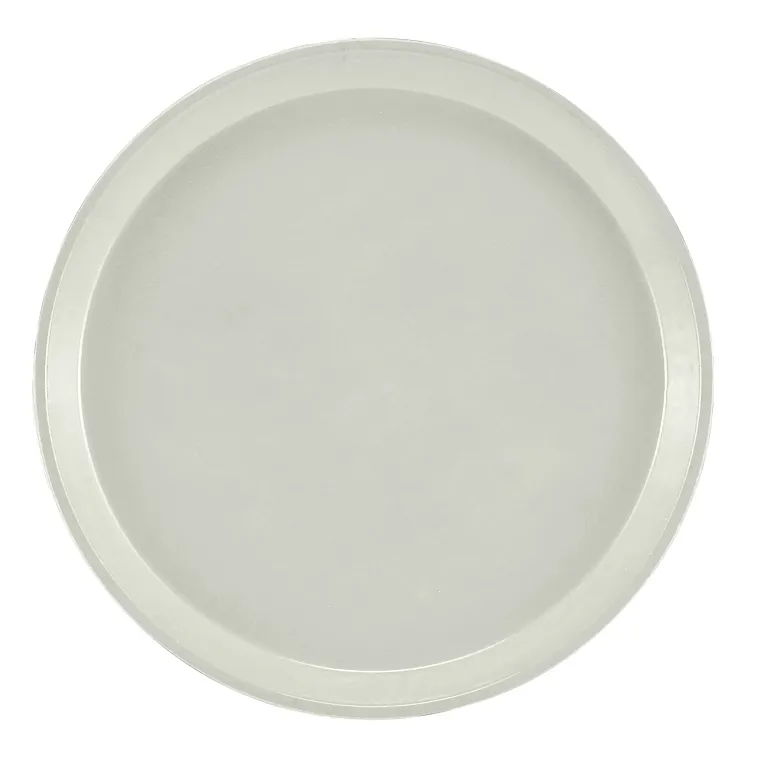 A plain, round, white plate viewed from above. The plate has a slightly raised rim and smooth, glossy surface with no patterns or decorations—reminiscent of an NSF-certified fiberglass tray. The background is completely white, emphasizing its simple design.