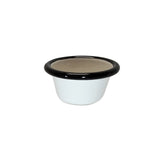 A small, white enamelware ramekin with a wide, thick black rim and 2 oz. capacity, featuring a beige interior. Simple and smooth with a glossy porcelain enamel finish and a slightly flared rim, it's set against a plain white background.