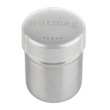 A stainless steel spice shaker with a clear plastic lid labeled “Nutmeg” in gray text. The lid has small holes for sprinkling, and the dishwasher safe container is cylindrical with a smooth, polished finish.