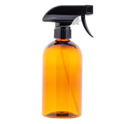 A 16 oz spray bottle made of brown amber glass with a black plastic trigger nozzle, shown against a plain white background. The cylindrical kitchen spray bottle is ideal for dispensing liquids like cleaners or water, with a visible plastic tube inside.