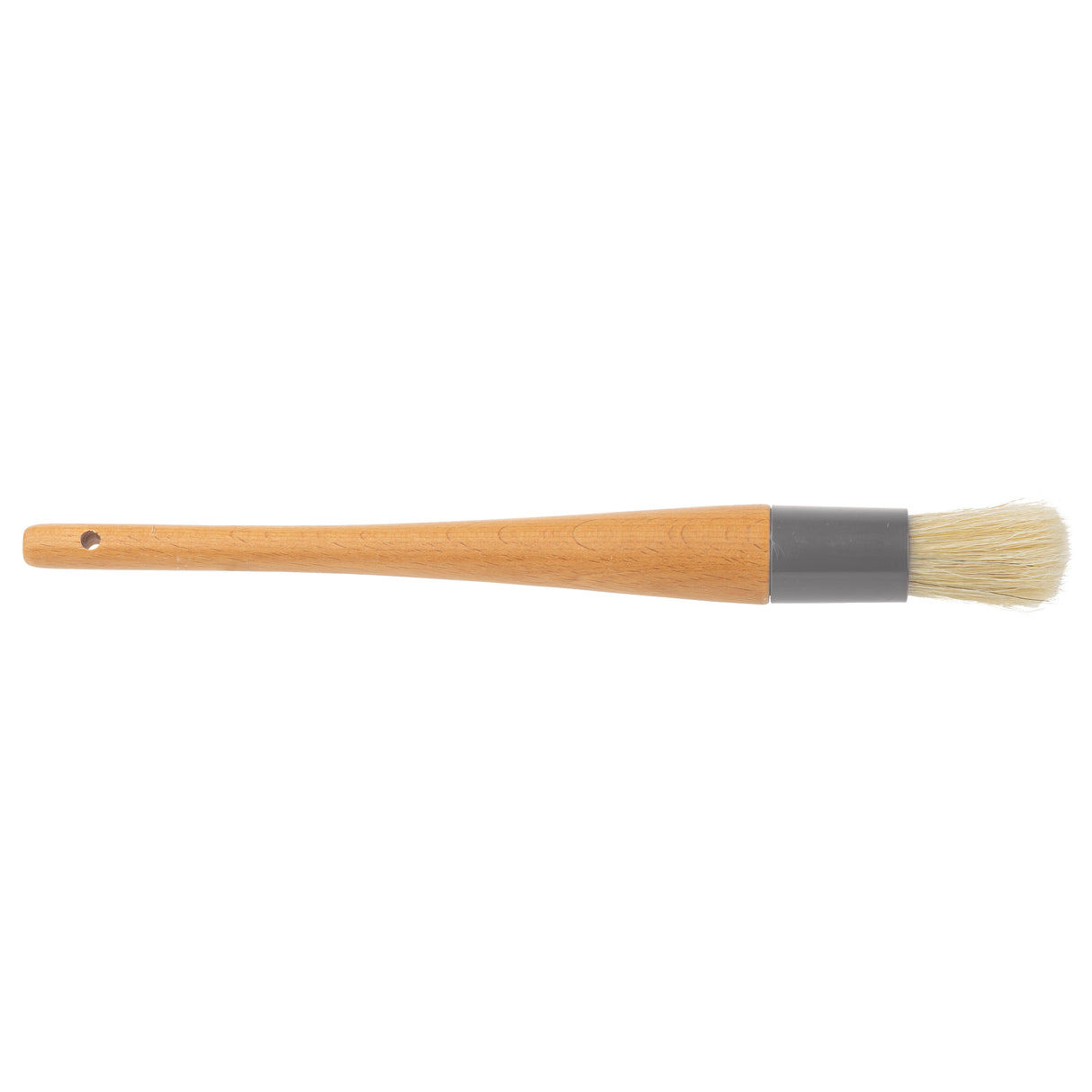 A round basting brush with a light wooden handle, gray metal ferrule, and light boar hair bristles. The handle tapers toward the middle and has a small hole near the end for hanging. The brush is positioned horizontally on a white background.