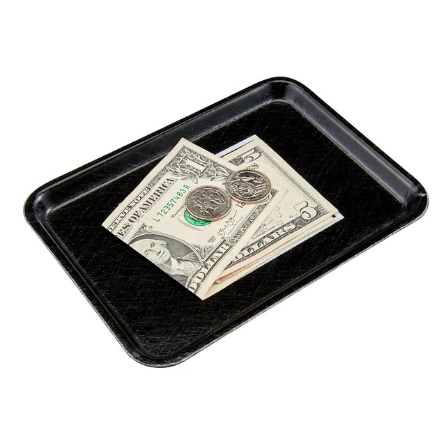 A small black Camtray high-impact fiberglass tray holds a five-dollar bill, a one-dollar bill, a quarter, and a half-dollar coin, arranged neatly on a white background—suggesting a payment or tip left on this dishwasher safe tray.