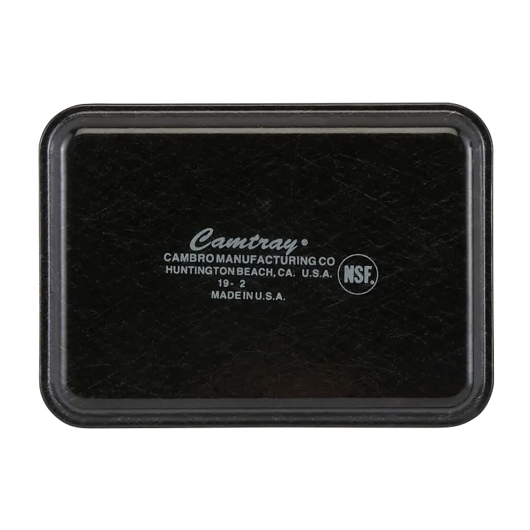 A rectangular, black Camtray food tray with a textured surface. Made from high-impact fiberglass, it is dishwasher safe. The center features white text with “Cambro Manufacturing Co, Huntington Beach, CA, U.S.A.” and has rounded edges with a slight shine.