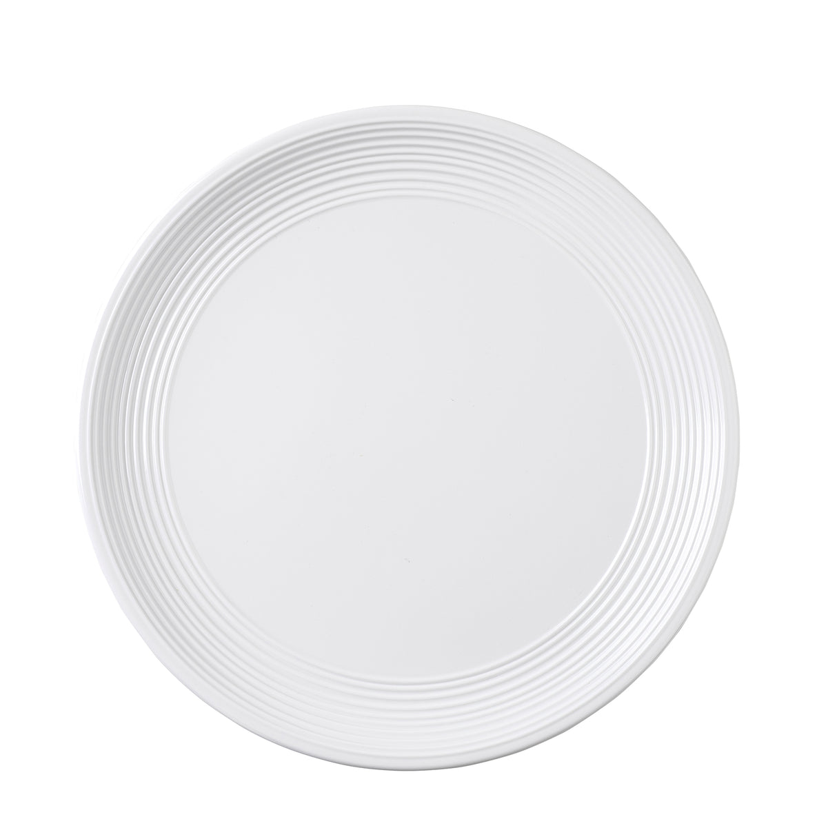 A plain white round plate from the Pulito Collection seen from above, featuring concentric ridges along the edge and a smooth, flat center. The background is white, highlighting the plate’s subtle texture and simple design.