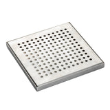 A square TableCraft stainless steel drip tray with evenly spaced circular holes arranged in a grid pattern. The plate is slightly raised, has a smooth, reflective surface, and is photographed against a plain white background.