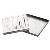 Two rectangular TableCraft stainless steel trays are shown. One solid drip tray sits beneath a perforated tray with evenly spaced round holes, the two trays slightly overlapping.