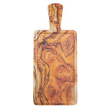 A rectangular olive wood serving paddle with a handle showcases natural grain patterns in warm brown and amber tones. The surface features visible swirls and knots, emphasizing the wood’s organic texture against a white background.