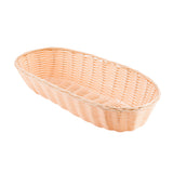 A light brown, oval-shaped hand-woven basket is empty and photographed against a white background. The basket features a woven pattern and gently curved sides, giving this polypropylene basket a shallow, elongated appearance.