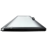 A rectangular, black-framed glass window from Empura Refrigeration is shown lying flat. The Door (Middle) features a metal latch handle on the left and a black pull handle on the right, with clear glass viewed from a low, front-facing angle.