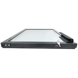 A horizontal view of a modern black-framed skylight window, shown flat with a clear glass pane, silver lock mechanism, and black handle on the right side—similar in style to Empura Refrigeration Door Middle parts—against a white background.