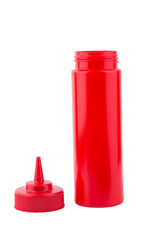 A bright red, empty 12 oz squeeze bottle stands upright with its pointed nozzle cap removed and placed beside it on a white background. This plastic, cylindrical ketchup bottle is often used for condiments like ketchup or sauces.