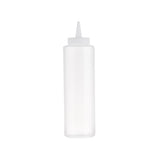 A clear, cylindrical 12 oz Squeeze Bottle with a pointed nozzle cap sits upright on a white background. The empty bottle is designed for precise dispensing of liquids, such as sauces or condiments.
