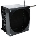A black metal heat exchanger unit with a circular opening on the front, exposed condenser coil fins inside, and connection pipes extending from the top right. Multiple bolts and structural elements are visible on the side. Compatible with Empura Refrigeration systems.