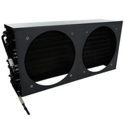 A black rectangular metal HVAC evaporator coil unit with two large circular openings, showing dark cooling fins inside. Several copper tubes and a pipe extend from the left side for connection to an Empura Refrigeration system. The background is plain white.