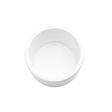 A small, round, white 2 oz. ramekin, viewed from above, empty and placed on a plain white background.