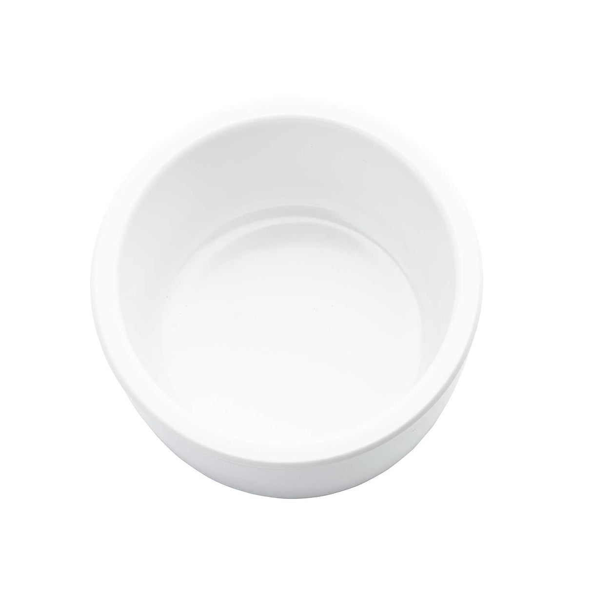 A plain, empty, round white 4 oz ramekin is shown from above on a white background. The bowl has smooth edges and a glossy finish, with no patterns or decorations. The image is minimalistic and well-lit.