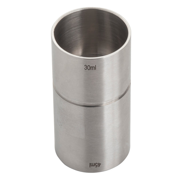 A polished stainless steel jigger, also known as a thimble jigger, features engraved markings for 30ml and 45ml measurements. This double-sided 1 oz jigger stands upright on a white background, making precise liquid measuring easy.